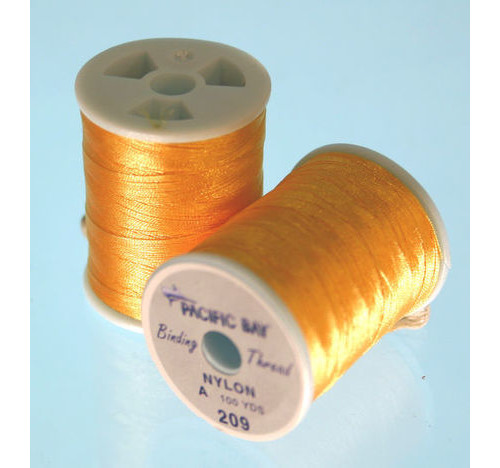 Bobines de 100 yards/mètres de fil en nylon calibre C orange clair.